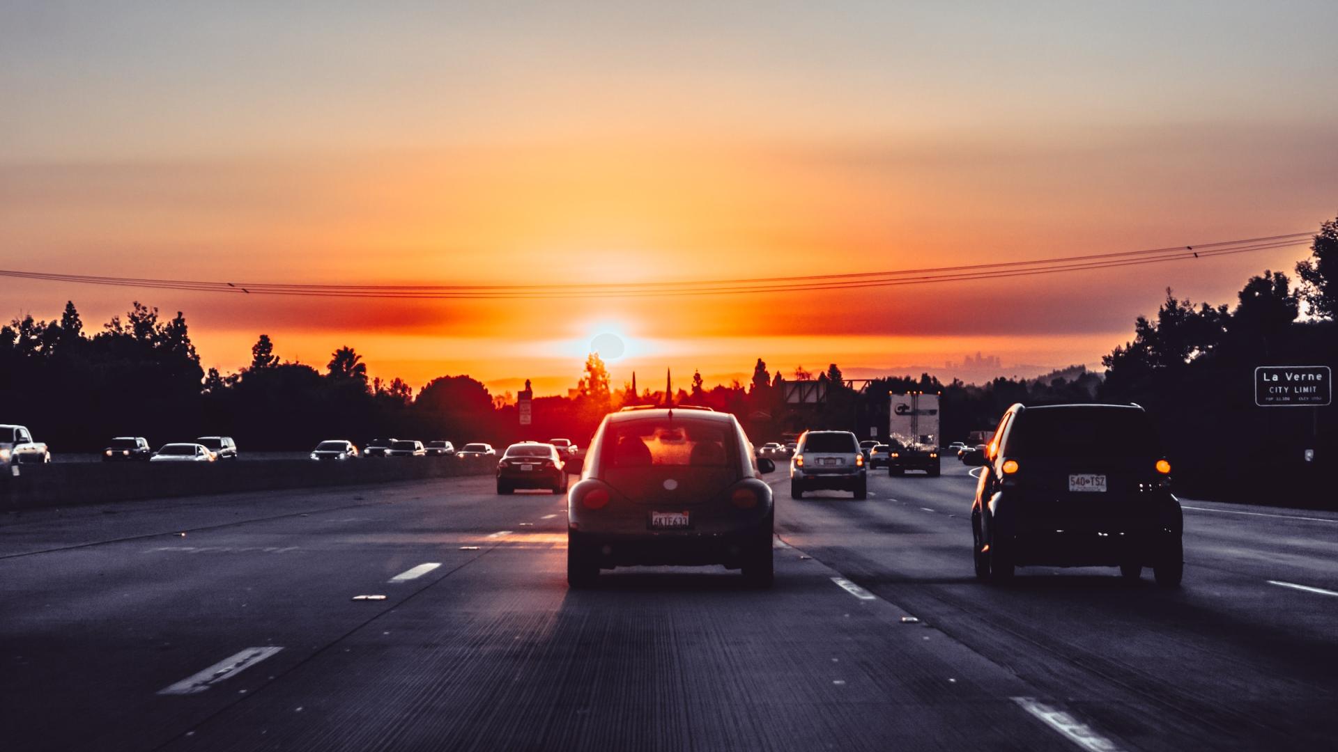 A sunset over a highway